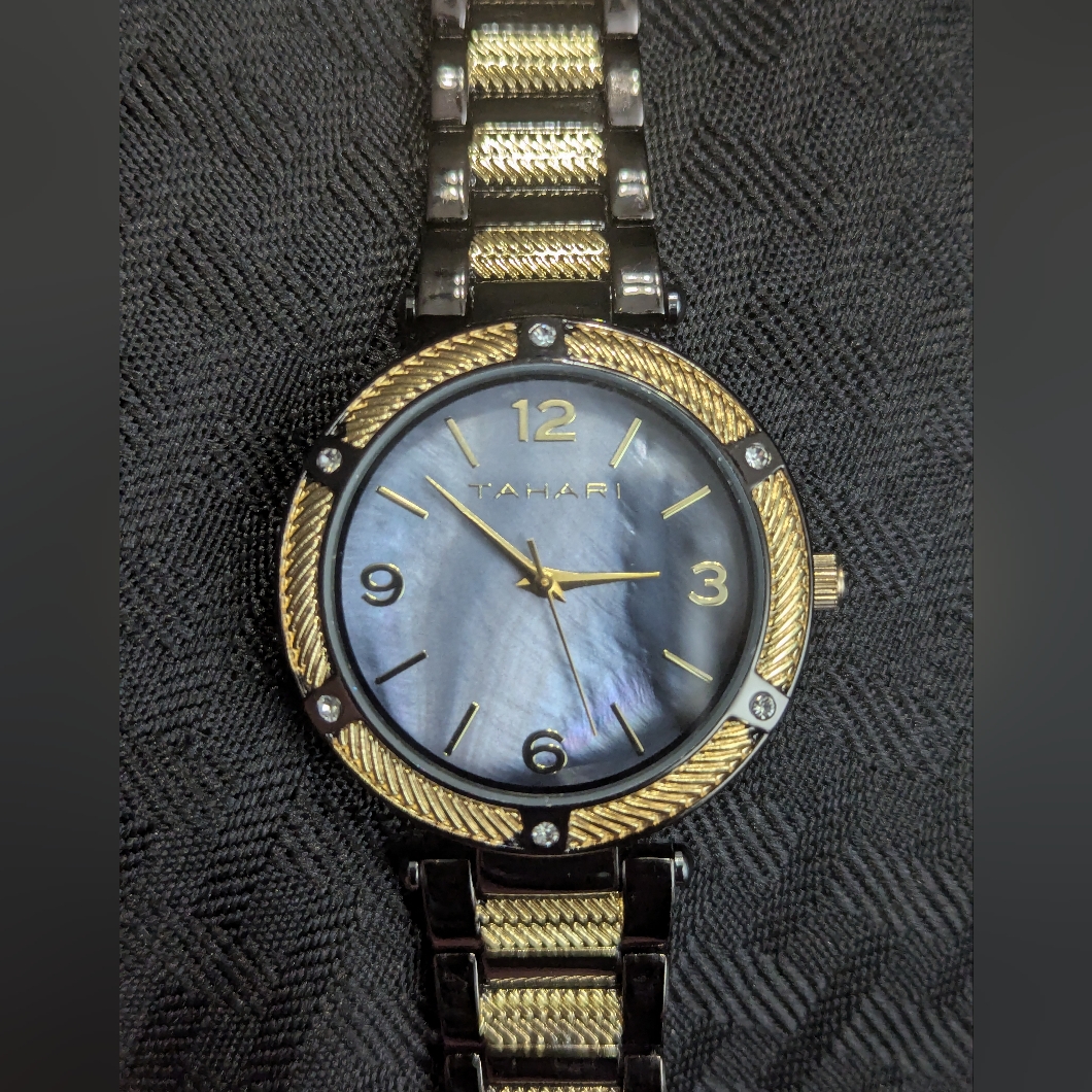 Black And Gold Marbled Tahari Watch 40$
